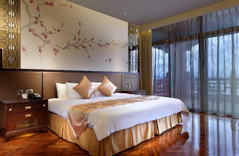 The Grand Hotel Taipéi Exterior foto A bedroom at the hotel